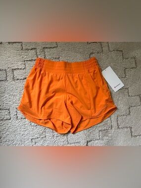 Lululemon Hotty Hot High Rise shorts Size 8 Lit Orange